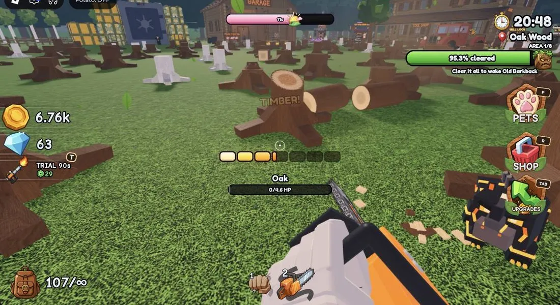 Hold left click on the trunk to bring trees down fastest