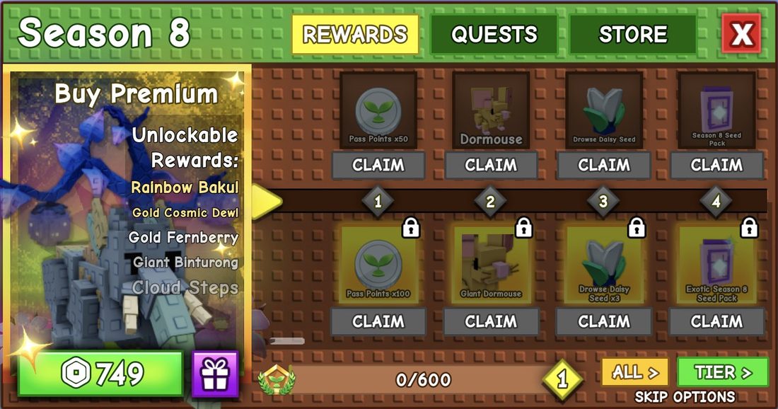 The REWARDS tab shows the free and premium rows for each tier